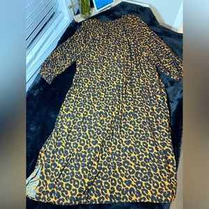 Plus size leopard print button down dress